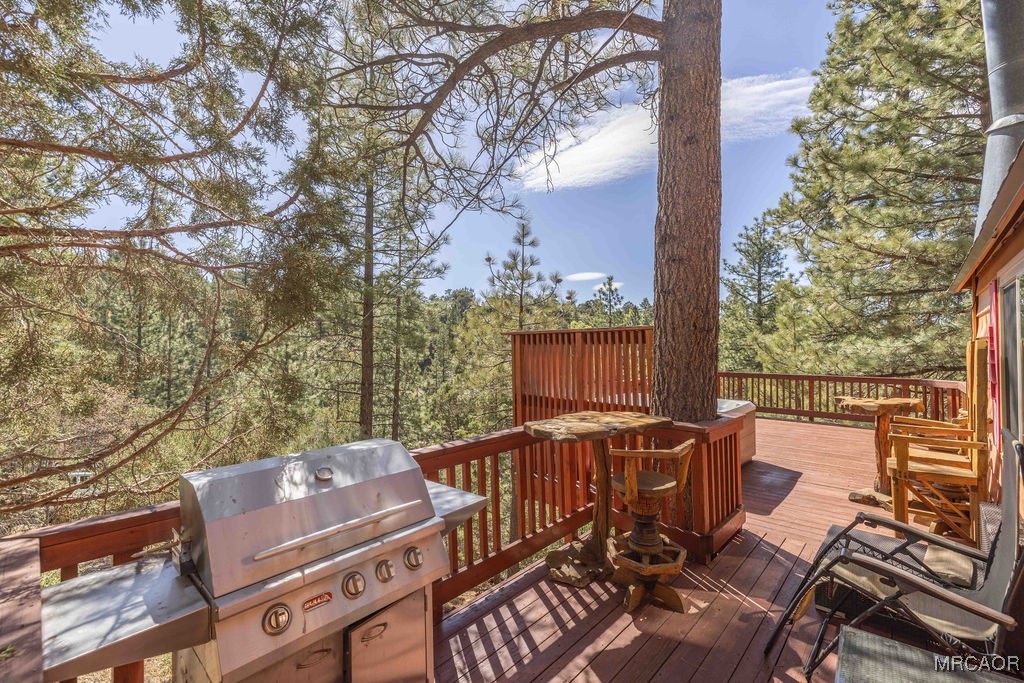 44185 Tim Ron Sugarloaf, CA 92386 - Photo 30 of 45 an outdoor view of the patio and dining space