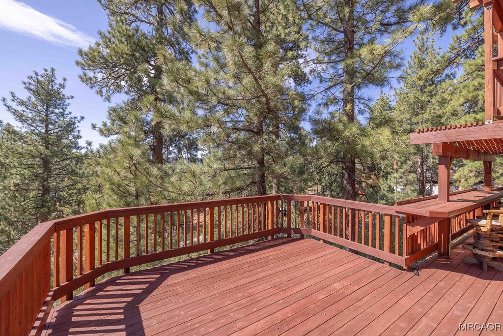 44185 Tim Ron Sugarloaf, CA 92386 - Photo 38 of 45 a view of deck with wooden floor and fence