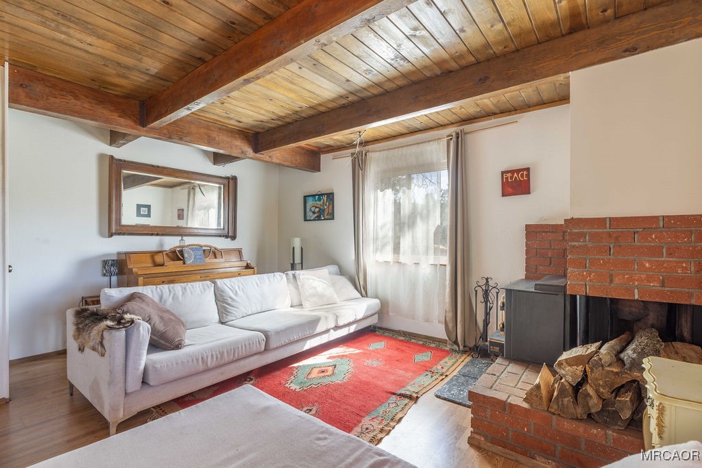 44185 Tim Ron Sugarloaf, CA 92386 - Photo 7 of 45 a living room with furniture and a flat screen tv