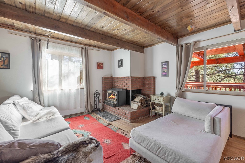 44185 Tim Ron Sugarloaf, CA 92386 - Photo 9 of 45 a living room with furniture and a large window