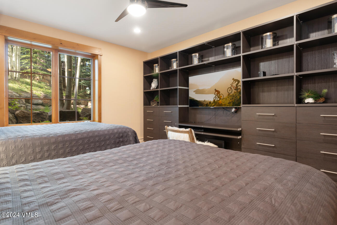 1087 Bachelor Ridge Road, Unit 104 Avon, CO 81620 - Photo 23 of 36 a bedroom with a bed and closet