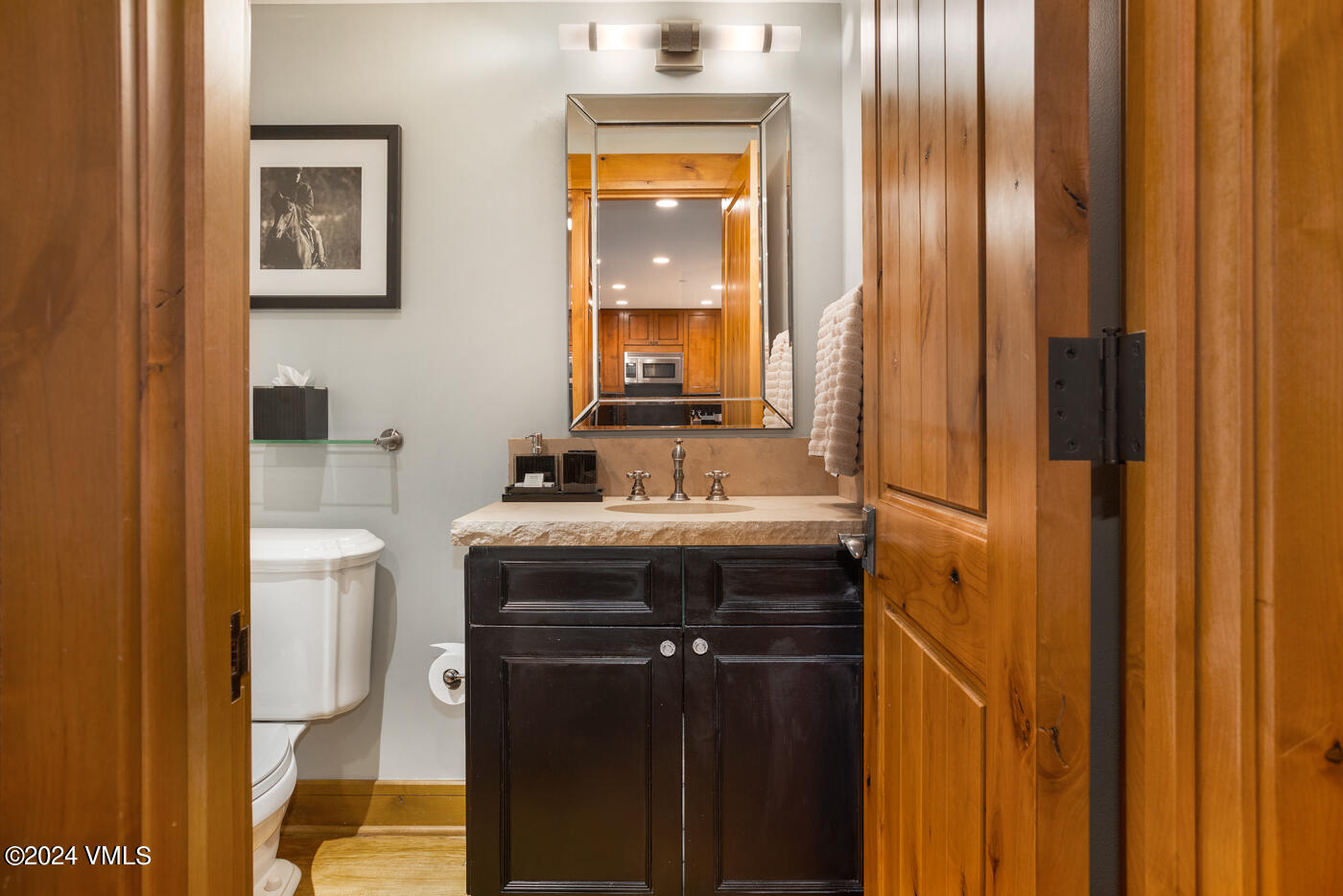 1087 Bachelor Ridge Road, Unit 104 Avon, CO 81620 - Photo 29 of 36 a bathroom with a sink a toilet and shower