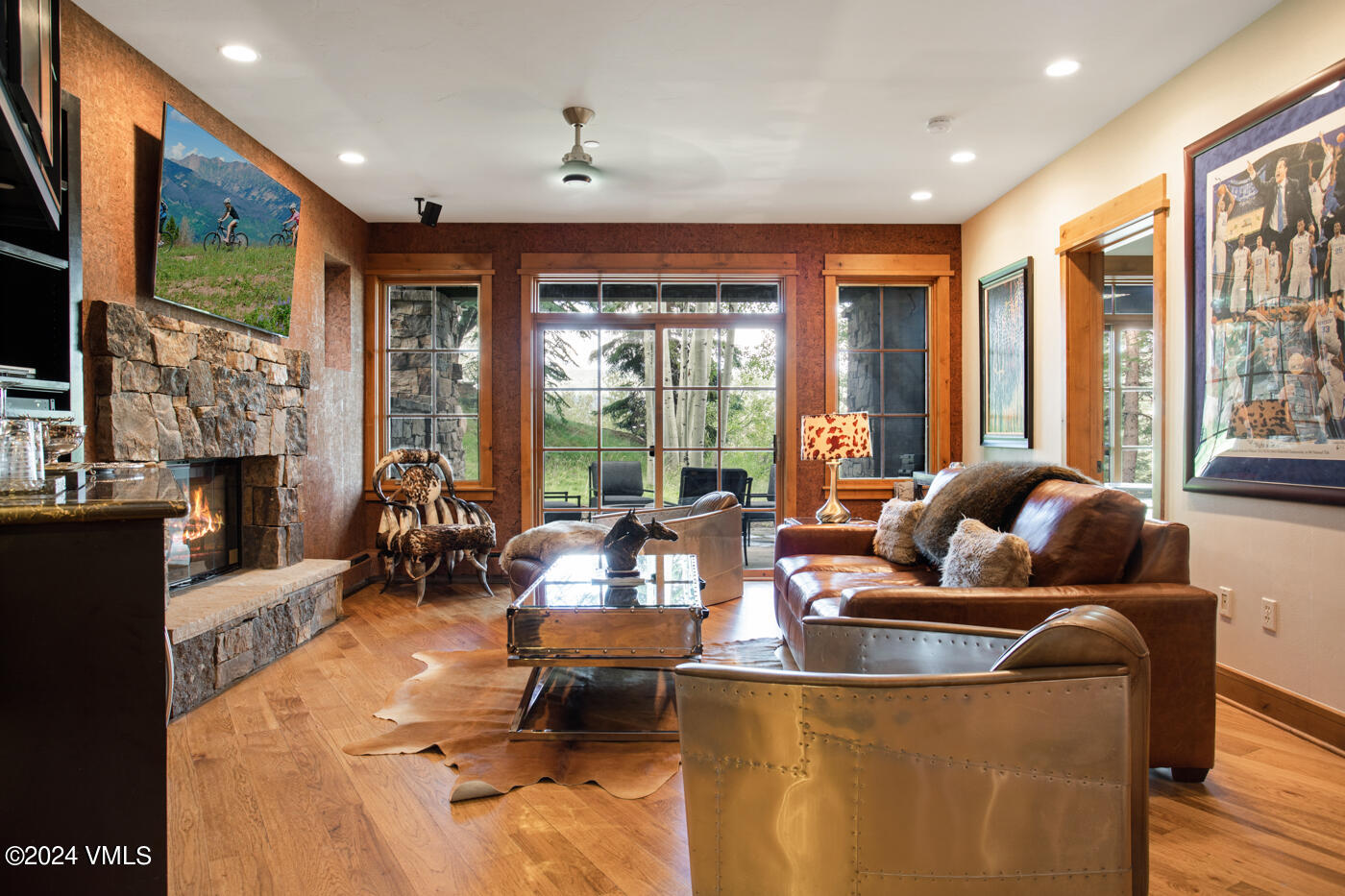 1087 Bachelor Ridge Road, Unit 104 Avon, CO 81620 - Photo 5 of 36 a living room with furniture and large windows