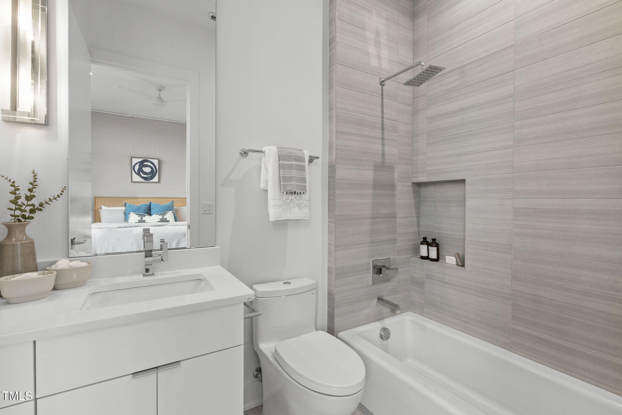 2329 Clark Avenue Raleigh, NC 27607 - Photo 20 of 34 a bathroom with a sink a toilet and shower