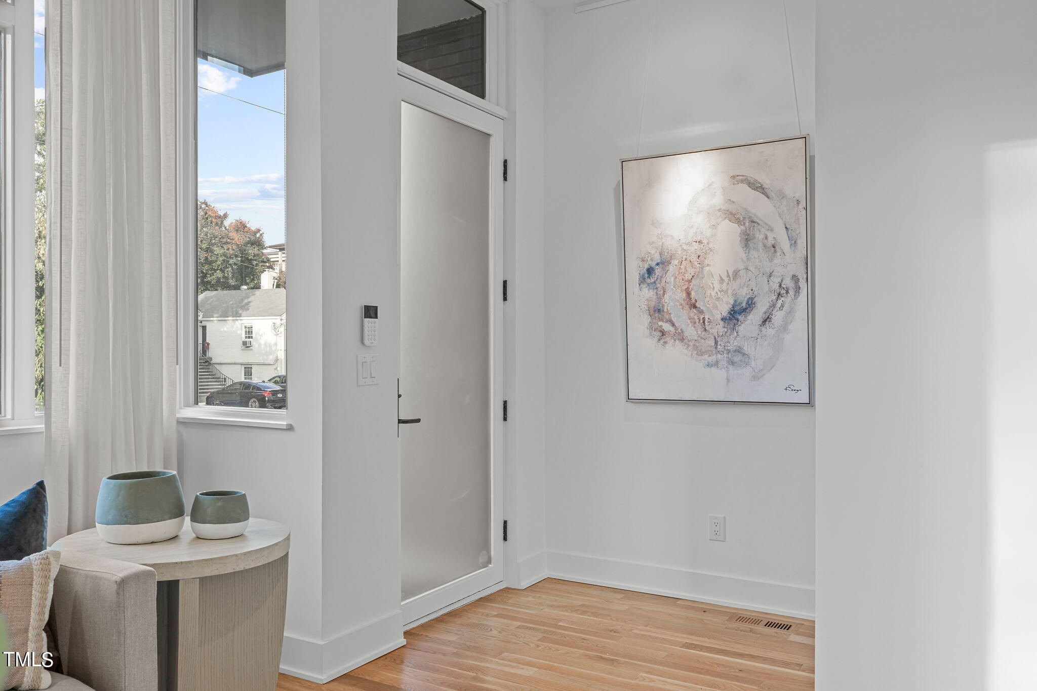 2329 Clark Avenue Raleigh, NC 27607 - Photo 3 of 34 a bathroom with a painting on the wall and a shower