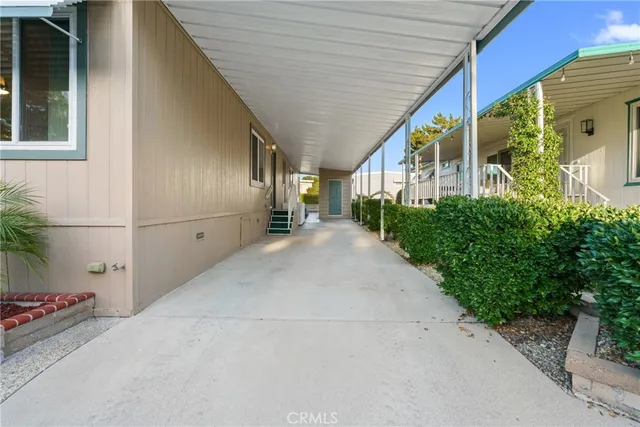 a view of a house with a street