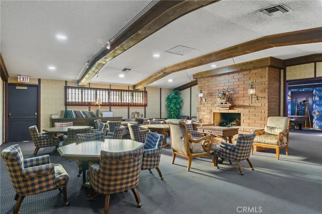 a outdoor space with patio furniture and a ceiling fan