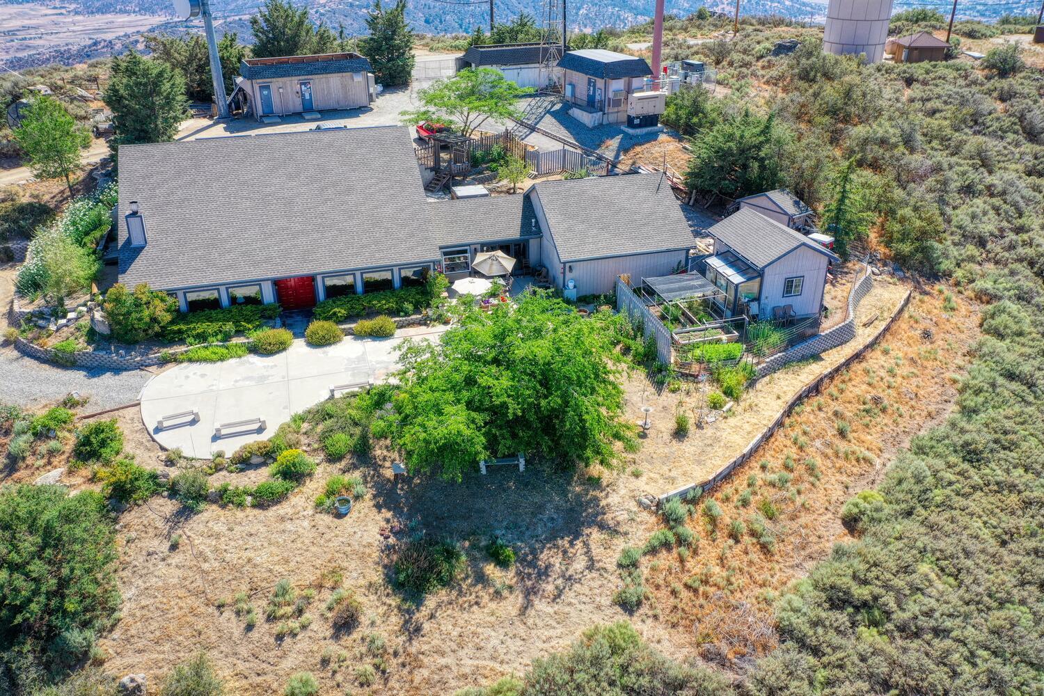 23760 El Rancho Drive Tehachapi, CA 93561 - Photo 2 of 40 an aerial view of a house with yard and parking