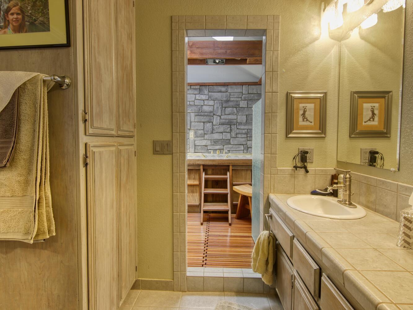 23760 El Rancho Drive Tehachapi, CA 93561 - Photo 22 of 40 a bathroom with a sink double vanity and a mirror