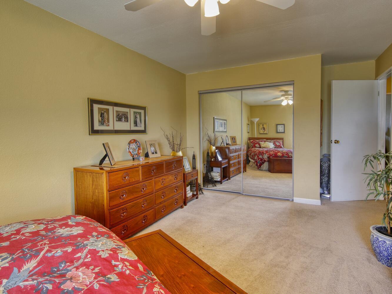 23760 El Rancho Drive Tehachapi, CA 93561 - Photo 29 of 40 a bed room with a bed and a mirror