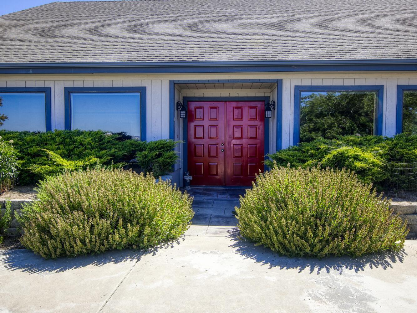 23760 El Rancho Drive Tehachapi, CA 93561 - Photo 5 of 40 a view of a house with a garden