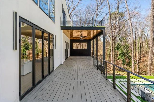 a view of outdoor space with wooden floor
