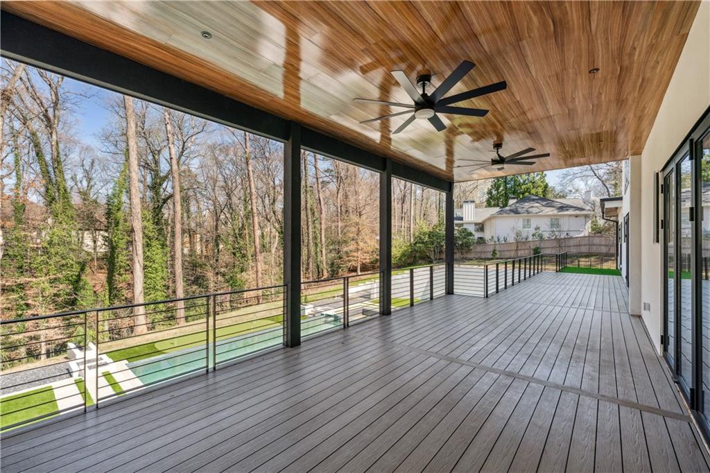 1355 Moores Mill Road Northwest Atlanta, GA 30327 - Photo 32 of 45 a view of outdoor space with wooden floor