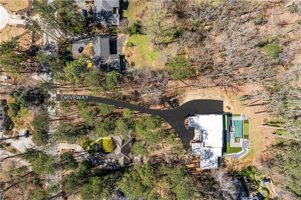 1355 Moores Mill Road Northwest Atlanta, GA 30327 - Photo 45 of 45 a aerial view of a house with a yard and large tree