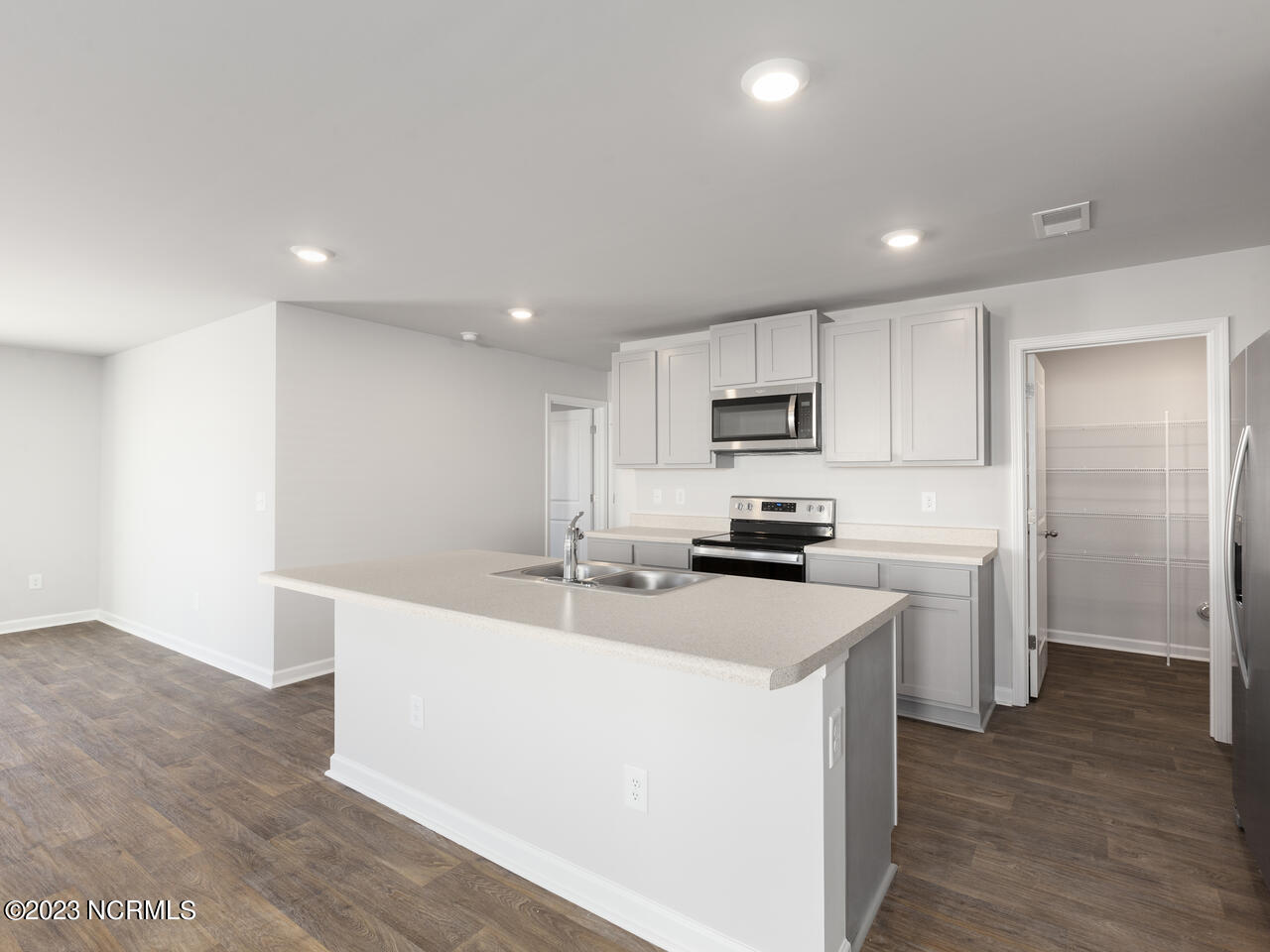 400 Folkstone Road, Unit LOT 105 Holly Ridge, NC 28445 - Photo 13 of 34 kitchen with pantry