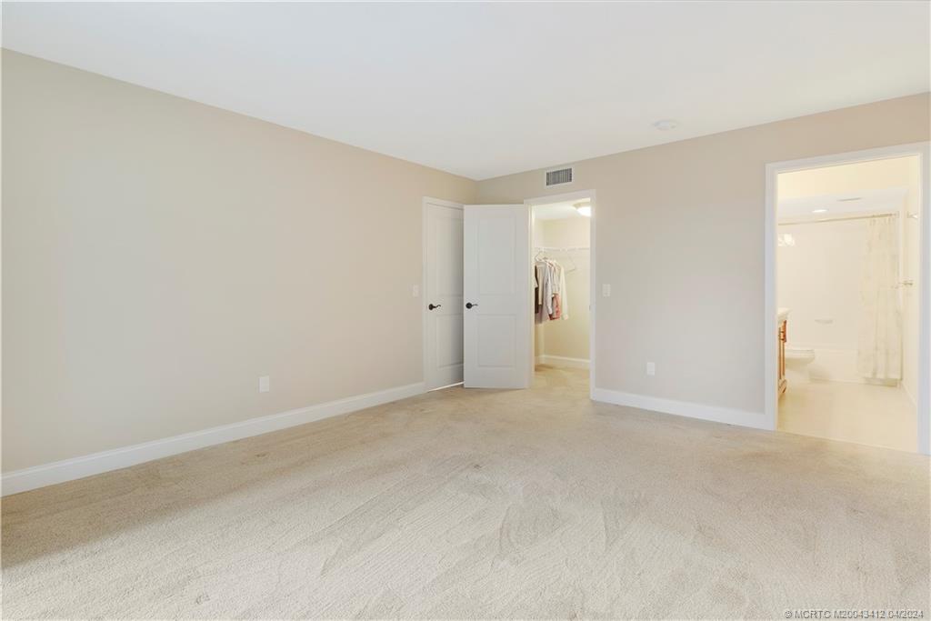 1864 Southwest Palm City Road, Unit 202 Stuart, FL 34994 - Photo 17 of 29 a view of an empty room