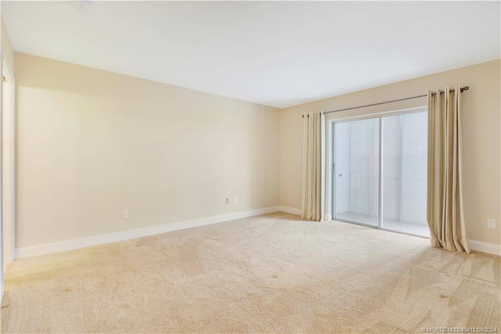 1864 Southwest Palm City Road, Unit 202 Stuart, FL 34994 - Photo 18 of 29 a view of an empty room