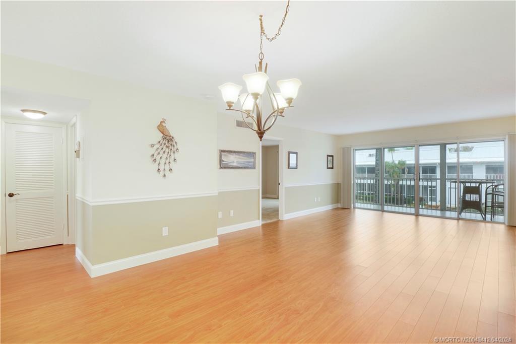 1864 Southwest Palm City Road, Unit 202 Stuart, FL 34994 - Photo 5 of 29 a view of livingroom with window