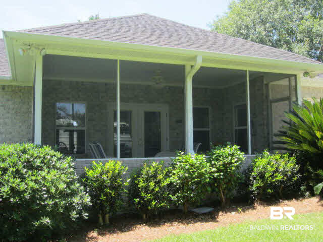 9104 Clubhouse Drive Foley, AL 36535 - Photo 6 of 31 Screened Porch