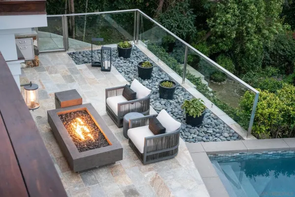a outdoor living space with patio furniture and a potted plant