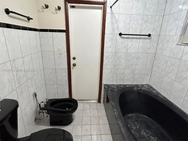 a view of backyard with green space