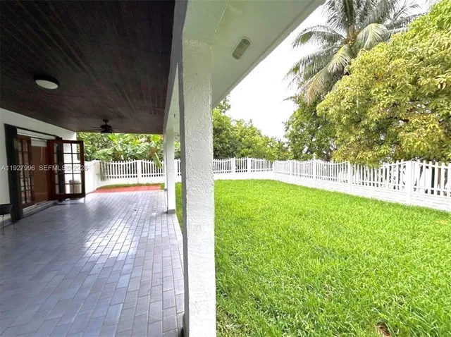 a view of a backyard with a garden