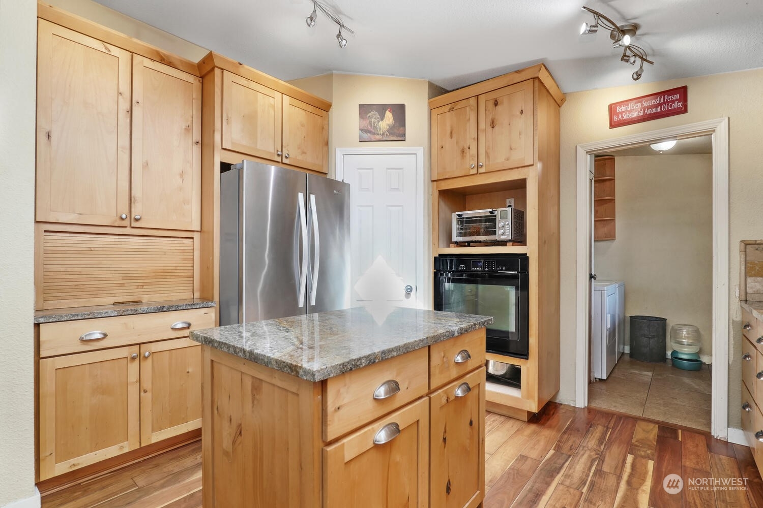 1722 Sunday Lake Road Stanwood, WA 98292 - Photo 11 of 32 a kitchen with stainless steel appliances granite countertop a refrigerator and microwave
