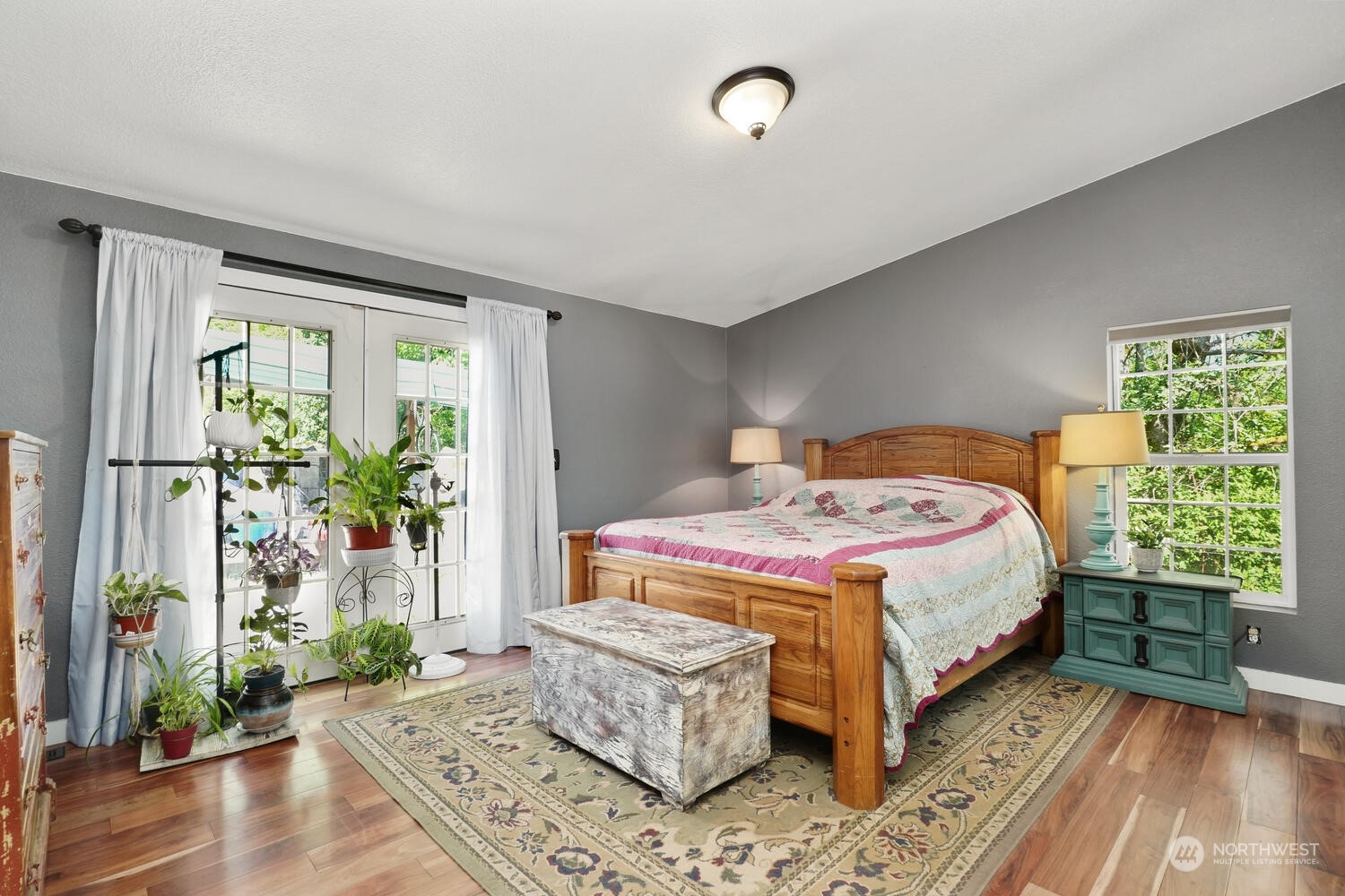 1722 Sunday Lake Road Stanwood, WA 98292 - Photo 15 of 32 a bedroom with a bed and a window