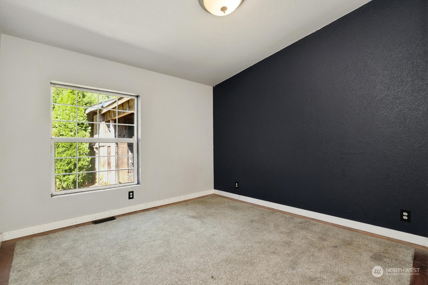 1722 Sunday Lake Road Stanwood, WA 98292 - Photo 18 of 32 an empty room with a window