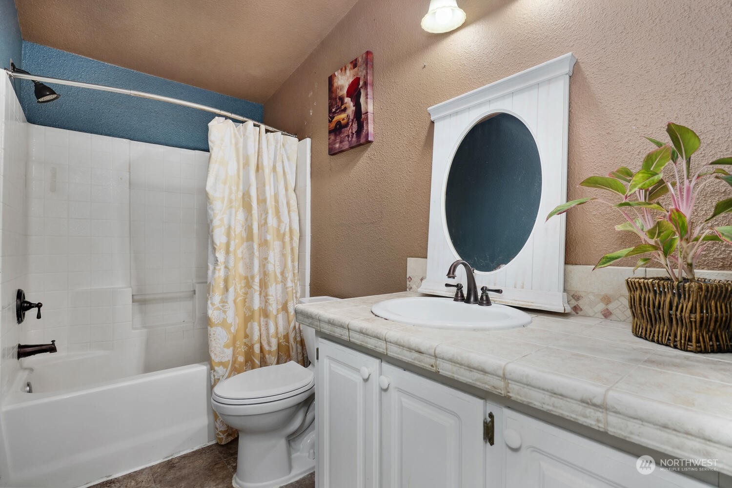 1722 Sunday Lake Road Stanwood, WA 98292 - Photo 20 of 32 a bathroom with a granite countertop bathtub sink vanity mirror and toilet