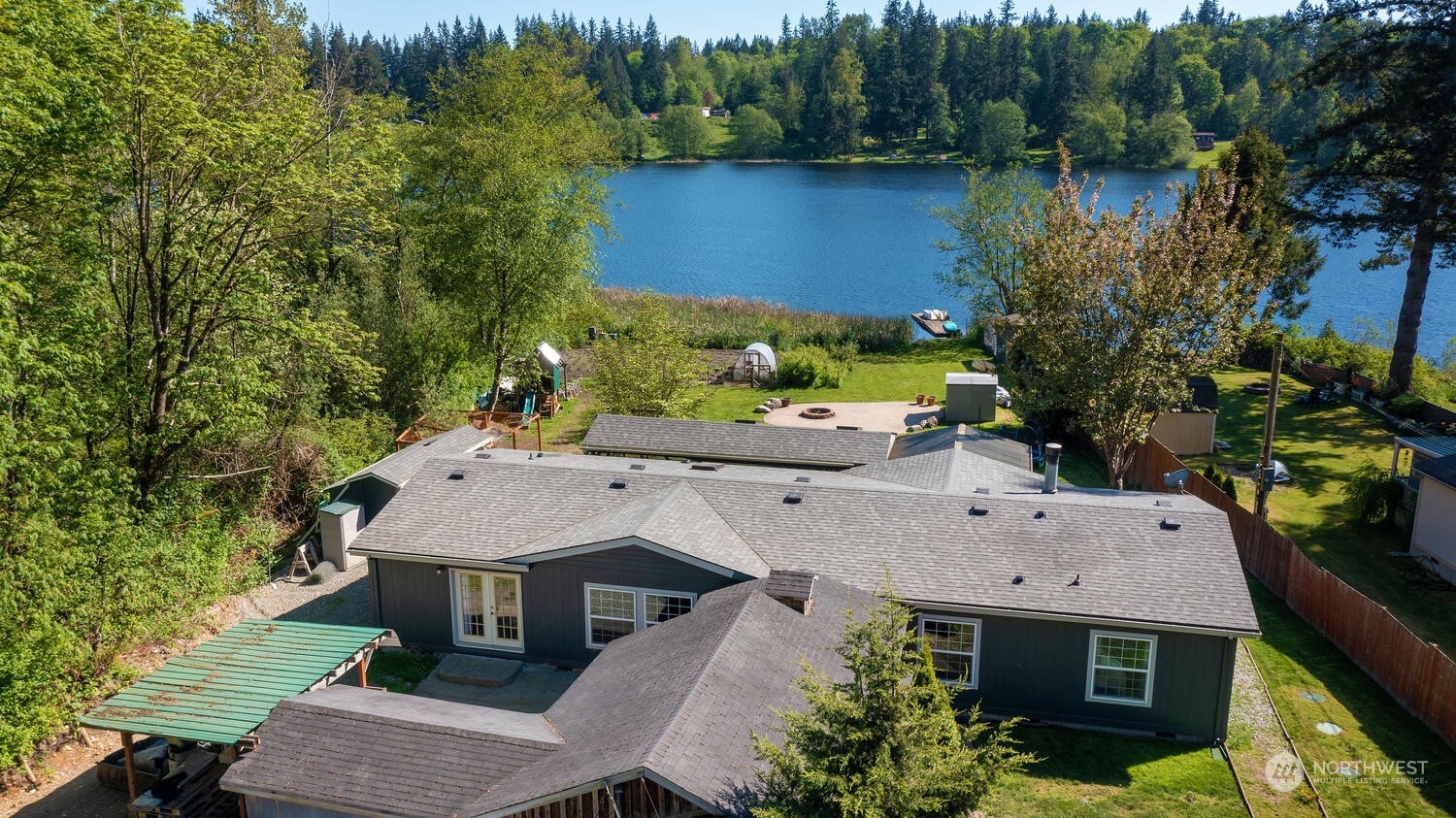 1722 Sunday Lake Road Stanwood, WA 98292 - Photo 28 of 32 an aerial view of a house with a yard and lake view