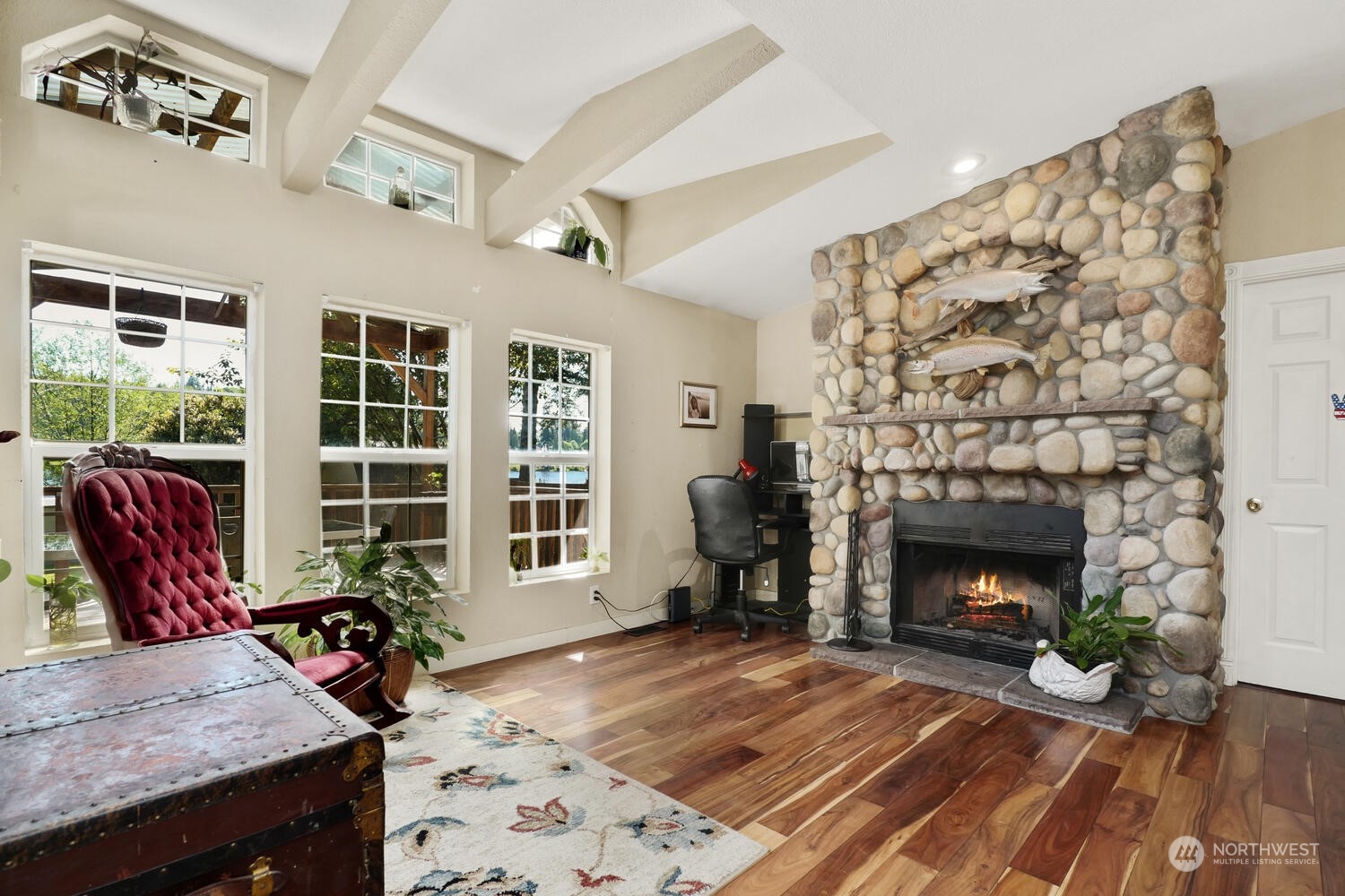 1722 Sunday Lake Road Stanwood, WA 98292 - Photo 4 of 32 a living room with furniture and a fireplace