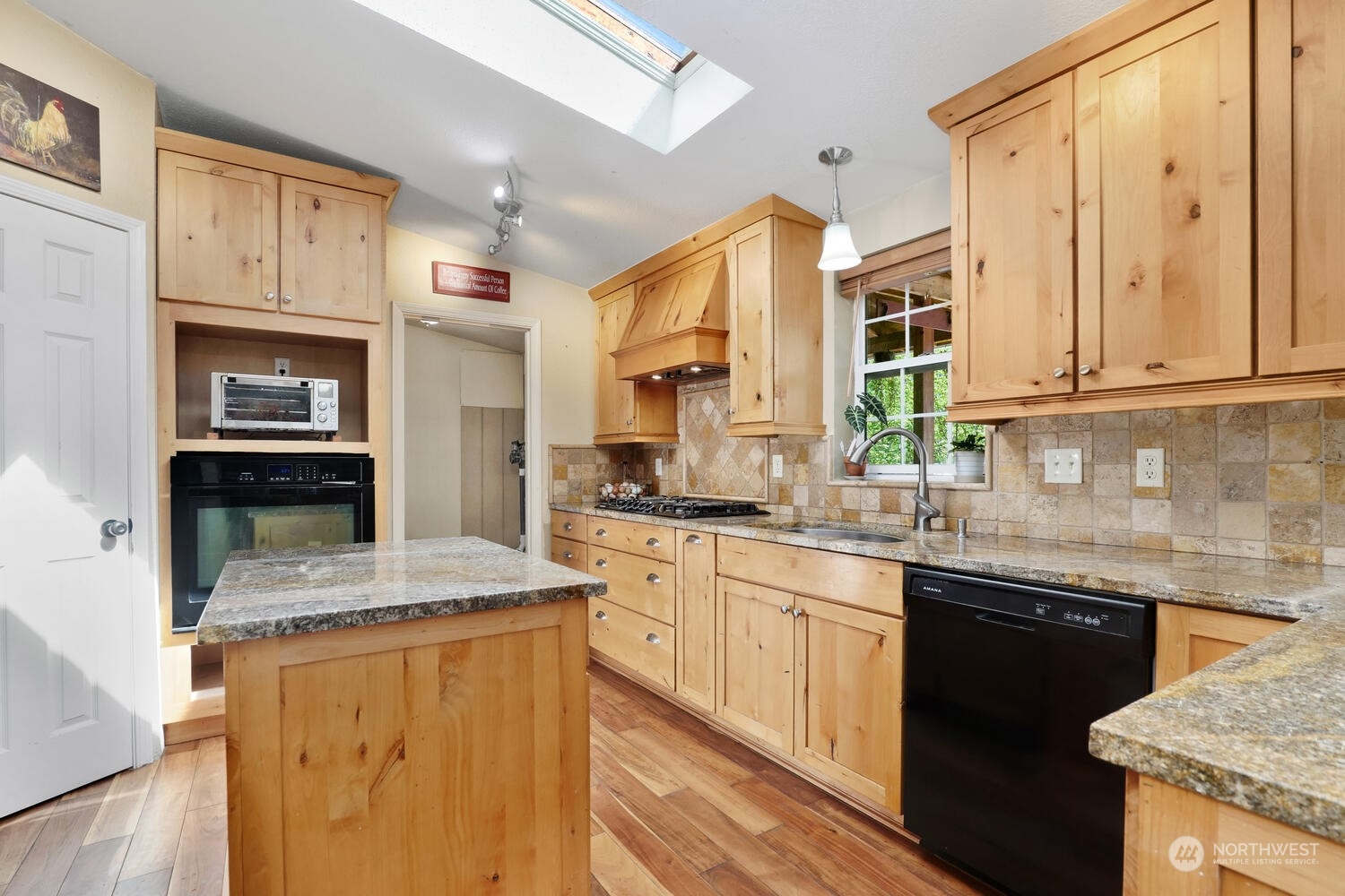 1722 Sunday Lake Road Stanwood, WA 98292 - Photo 8 of 32 a kitchen with stainless steel appliances granite countertop a sink stove and cabinets
