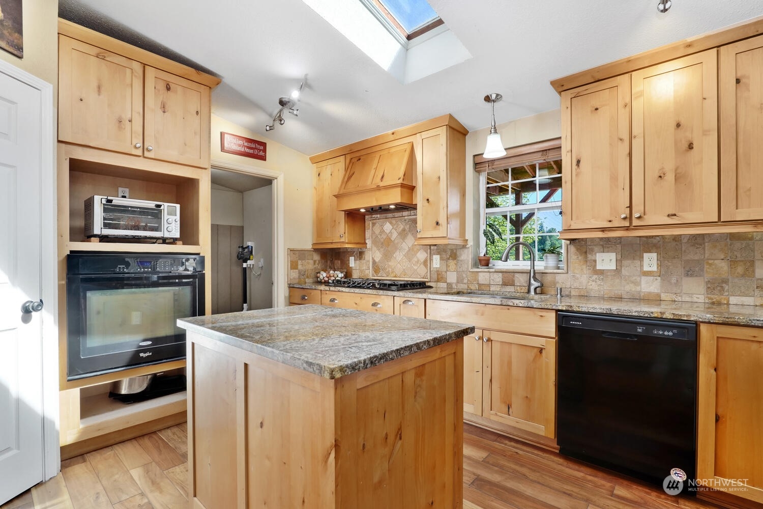 1722 Sunday Lake Road Stanwood, WA 98292 - Photo 10 of 32 a kitchen with a sink stove and cabinets