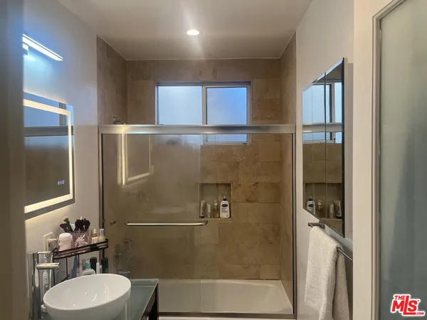 a bathroom with a toilet and a sink