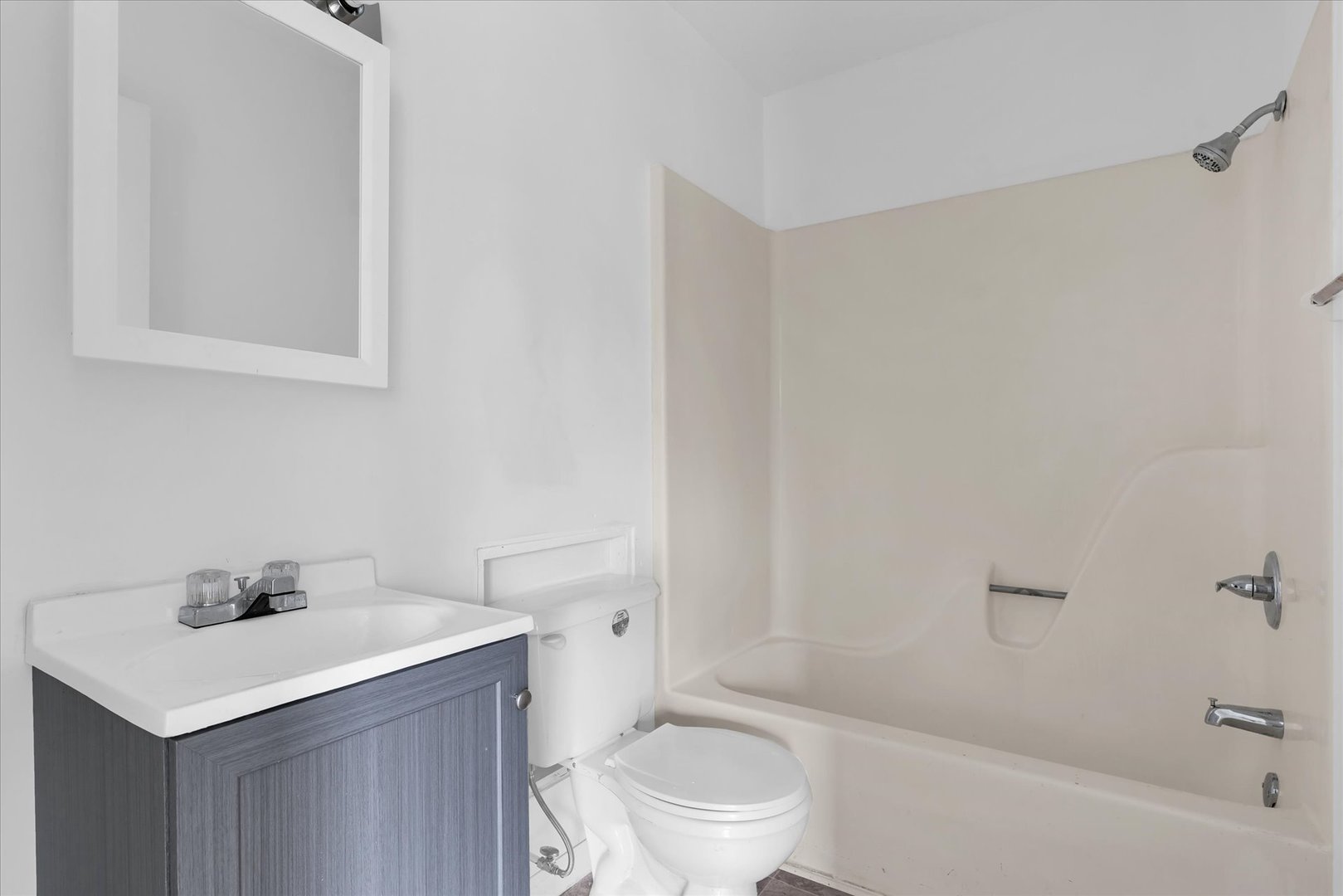 1740-1760 South Fairview Avenue Decatur, IL 62521 - Photo 21 of 26 a bathroom with a sink a toilet and shower