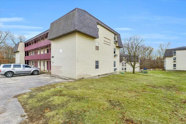 a car parked in front of a house