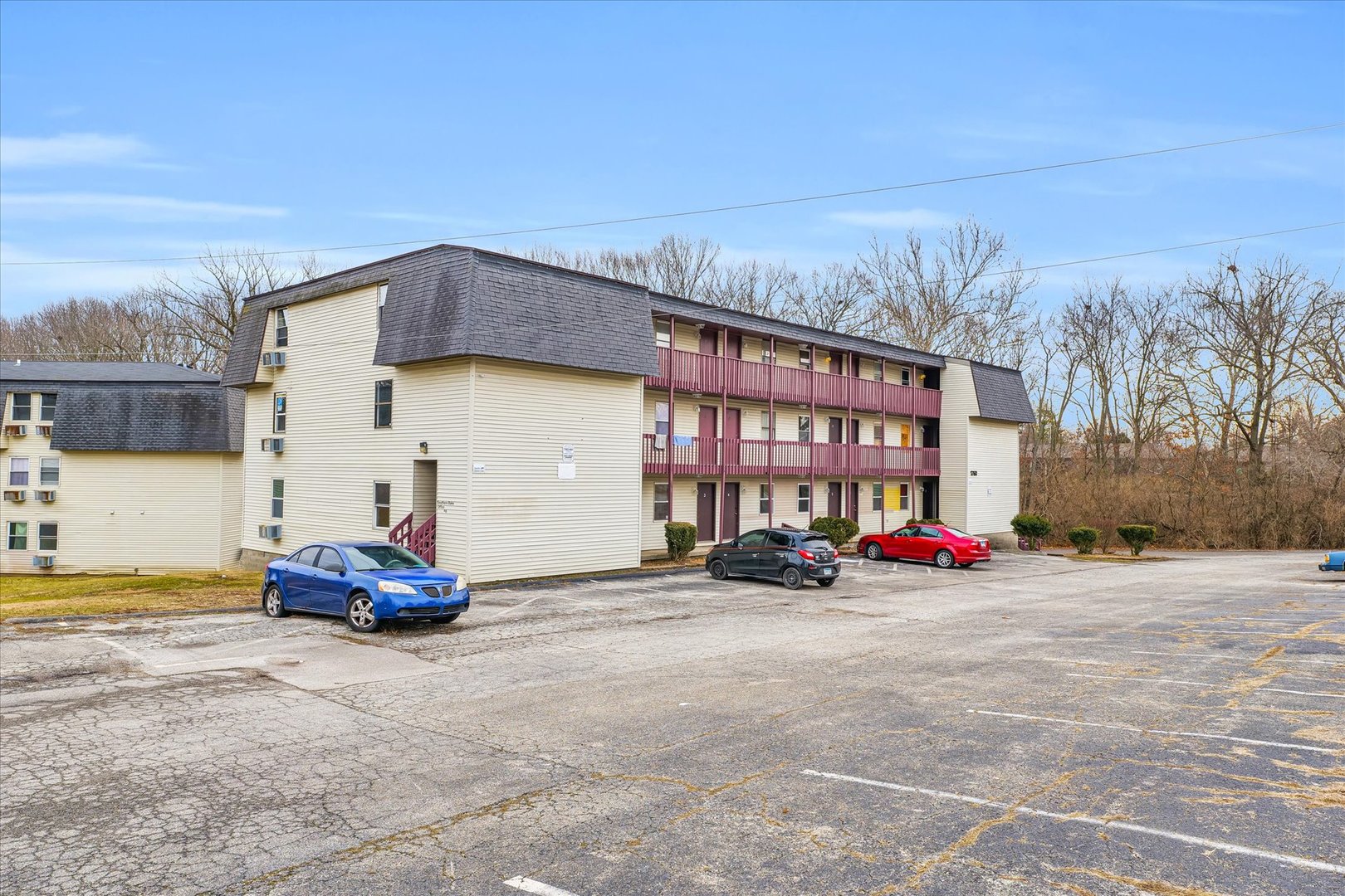 1740-1760 South Fairview Avenue Decatur, IL 62521 - Photo 10 of 26 a car parked in front of a house