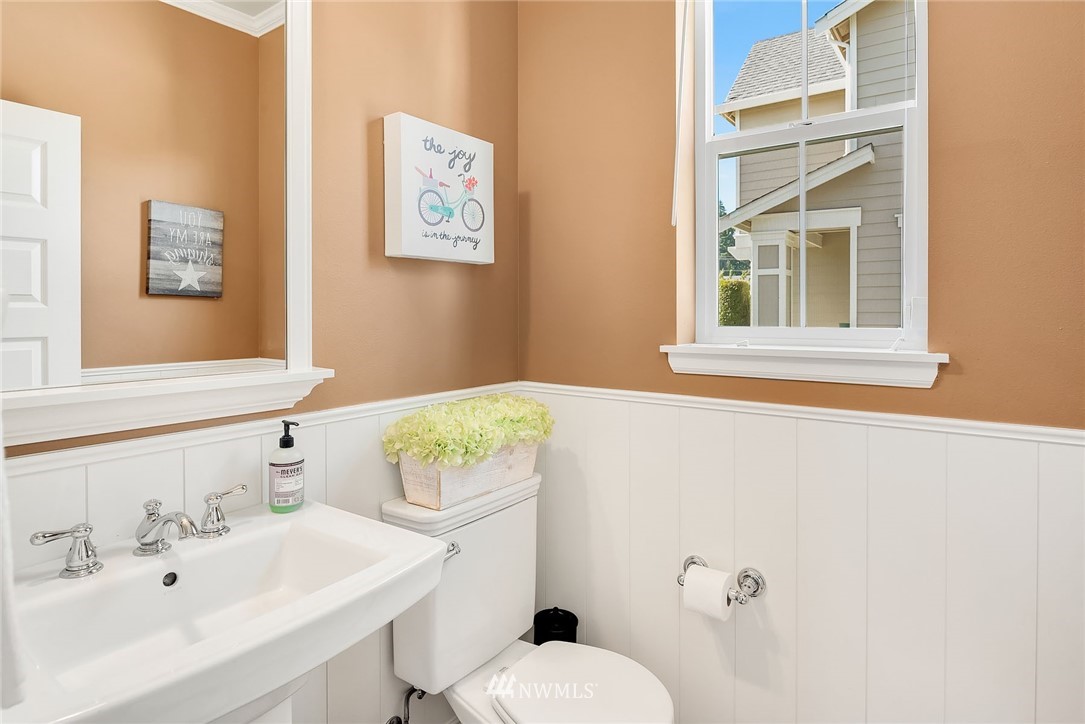 3617 183rd Place Southeast Bothell, WA 98012 - Photo 12 of 27 a bathroom with a sink mirror and toilet