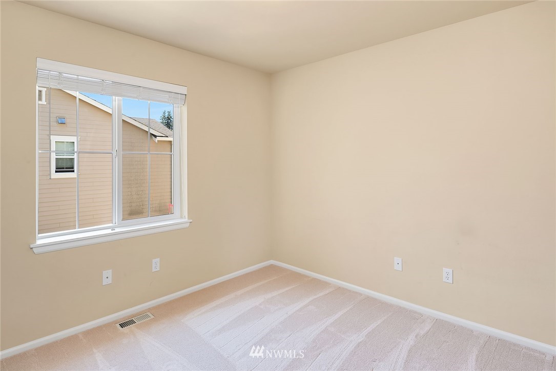 3617 183rd Place Southeast Bothell, WA 98012 - Photo 18 of 27 a view of an empty room with a window