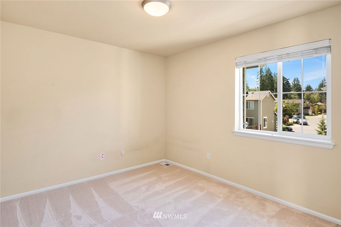 3617 183rd Place Southeast Bothell, WA 98012 - Photo 19 of 27 an empty room with a window
