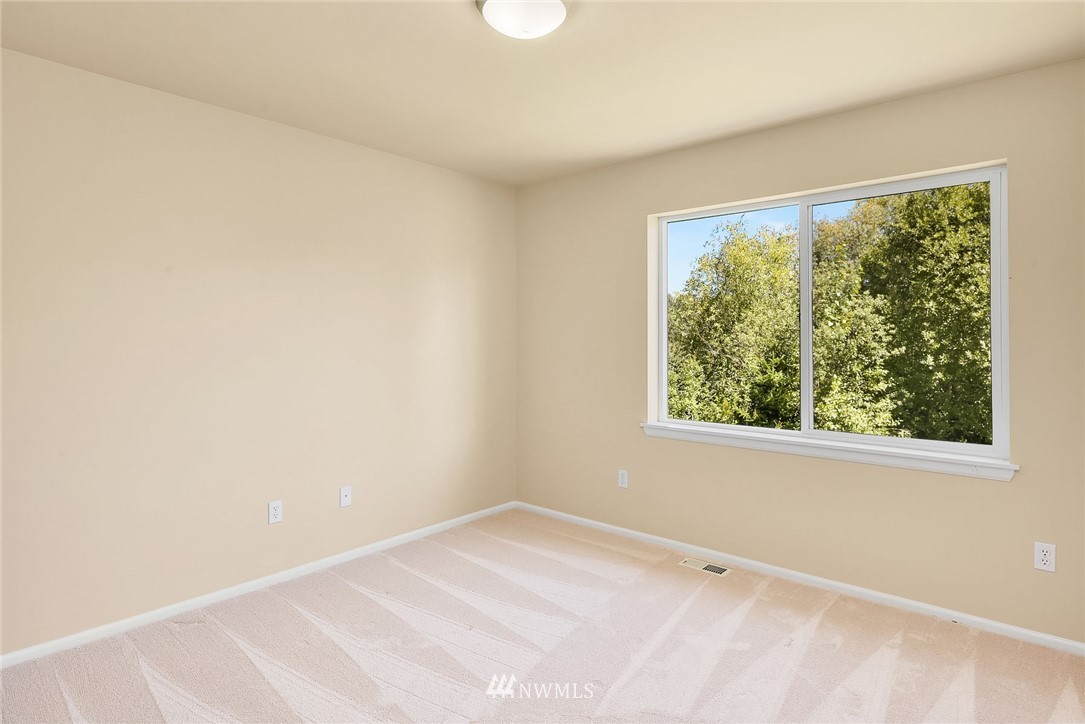 3617 183rd Place Southeast Bothell, WA 98012 - Photo 20 of 27 an empty room with a window