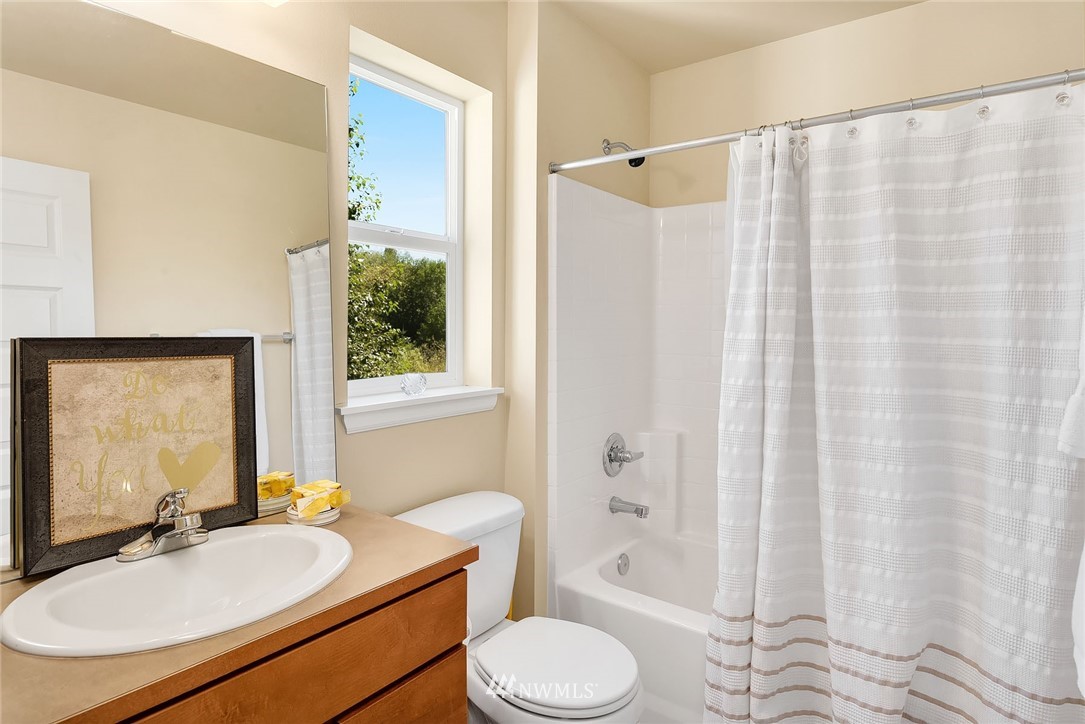 3617 183rd Place Southeast Bothell, WA 98012 - Photo 21 of 27 a bathroom with a sink toilet and shower