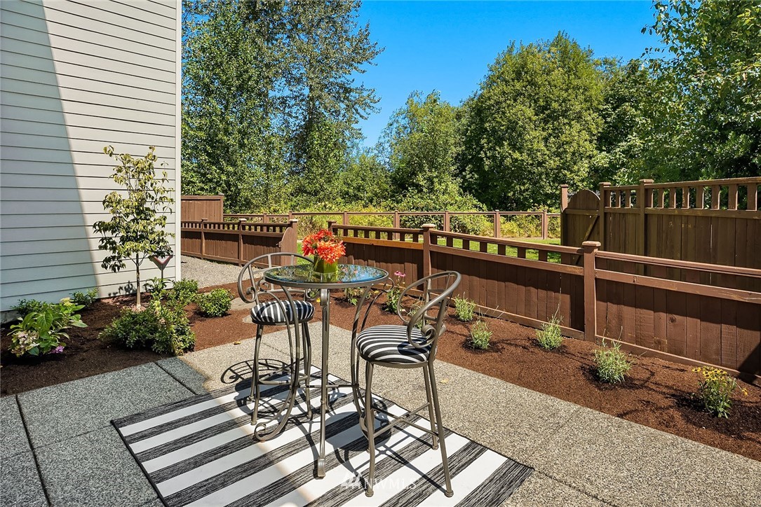 3617 183rd Place Southeast Bothell, WA 98012 - Photo 24 of 27 a view of a chairs and table in the patio