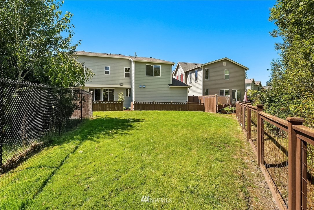 3617 183rd Place Southeast Bothell, WA 98012 - Photo 25 of 27 a view of a house with backyard and sitting area