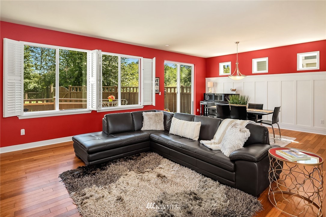 3617 183rd Place Southeast Bothell, WA 98012 - Photo 7 of 27 a living room with furniture and a large window