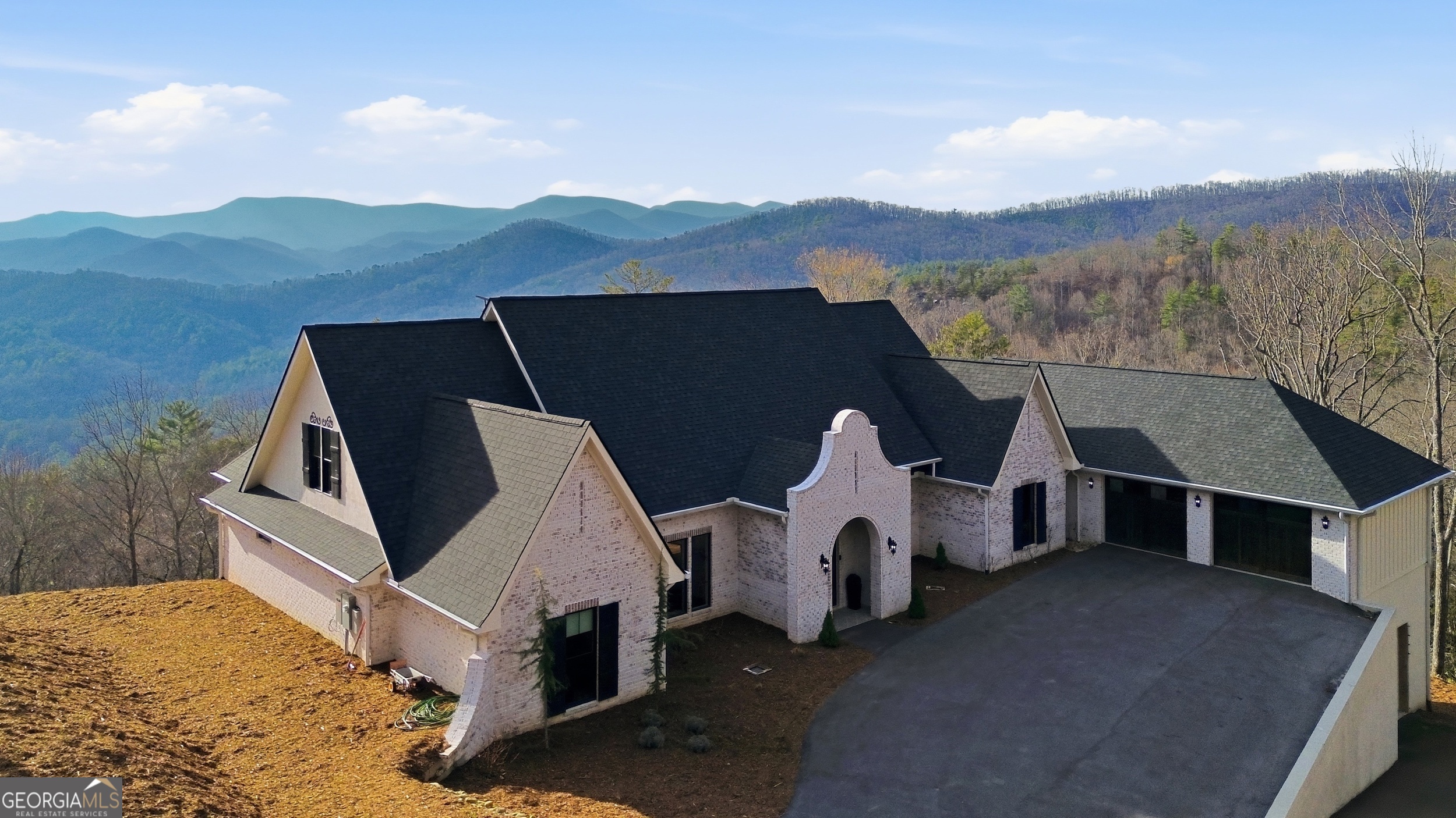 58 Buttons Lane Dillard, GA 30537 - Photo 3 of 77 a view of a house with mountain view