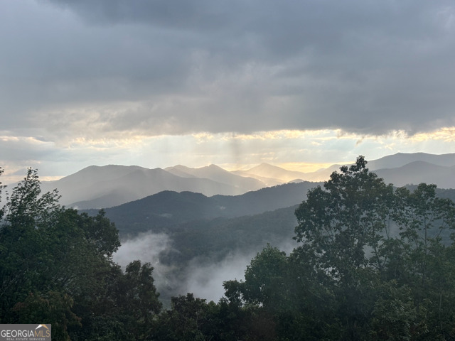 58 Buttons Lane Dillard, GA 30537 - Photo 5 of 77 a view of mountain with sunset in background
