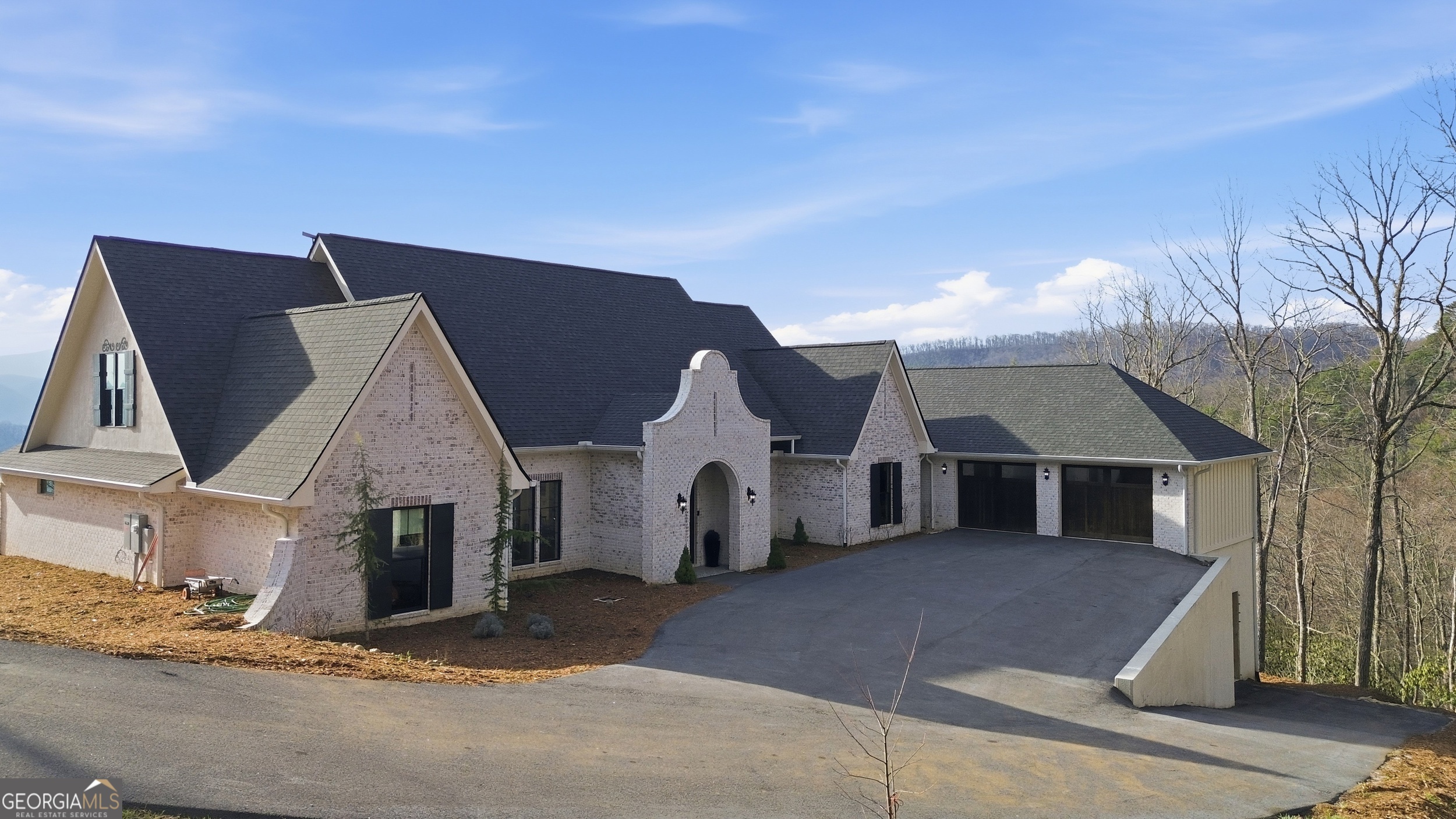 58 Buttons Lane Dillard, GA 30537 - Photo 8 of 77 a front view of house with garage