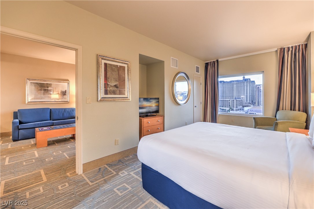 211 East Flamingo Road, Unit 1402 Las Vegas, NV 89169 - Photo 19 of 43 Bedroom featuring carpet